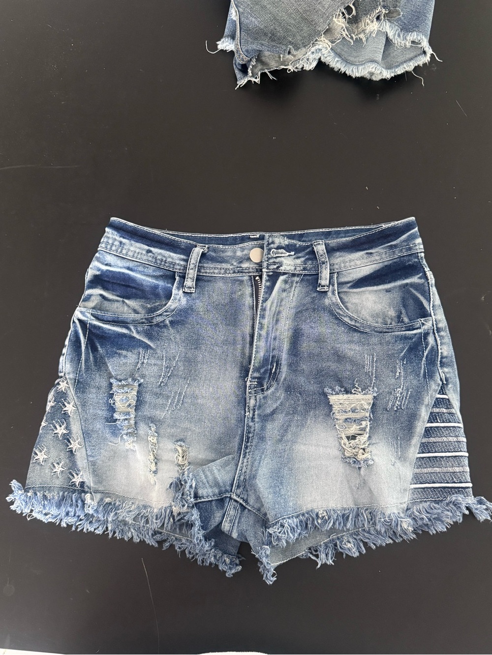 Distressed Blue Denim Women's Shorts with Frayed Hem